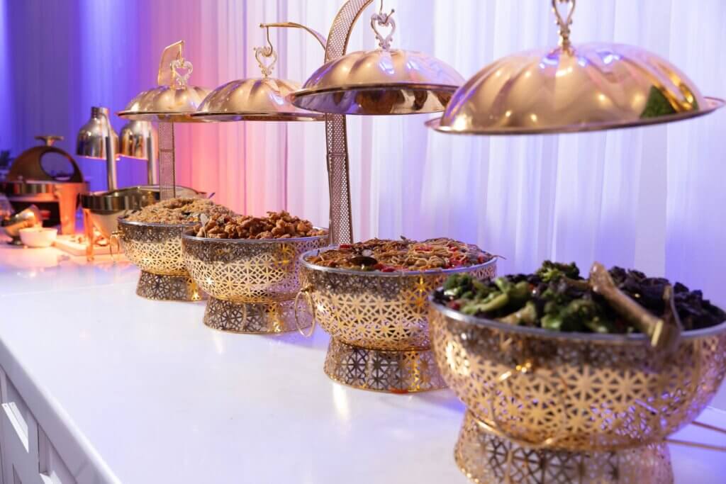 A table full of catered food.